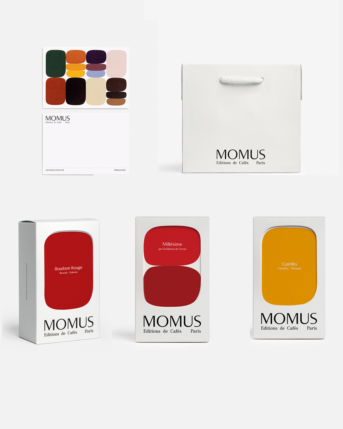 Coffret Spécial Filtre, incluant Bourbon Rouge, Millésime, et Castillo, livré dans un élégant packaging MOMUS.