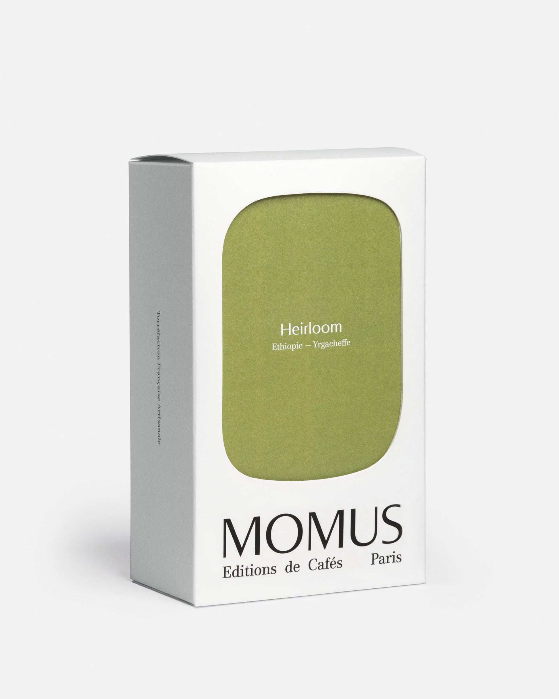Packaging 200g du café Momus Heirloom Éthiopie - Yrgacheffe. La boîte présente une grande forme vert olive/vert kaki et le texte indique « Heirloom Éthiopie – Yrgacheffe ».